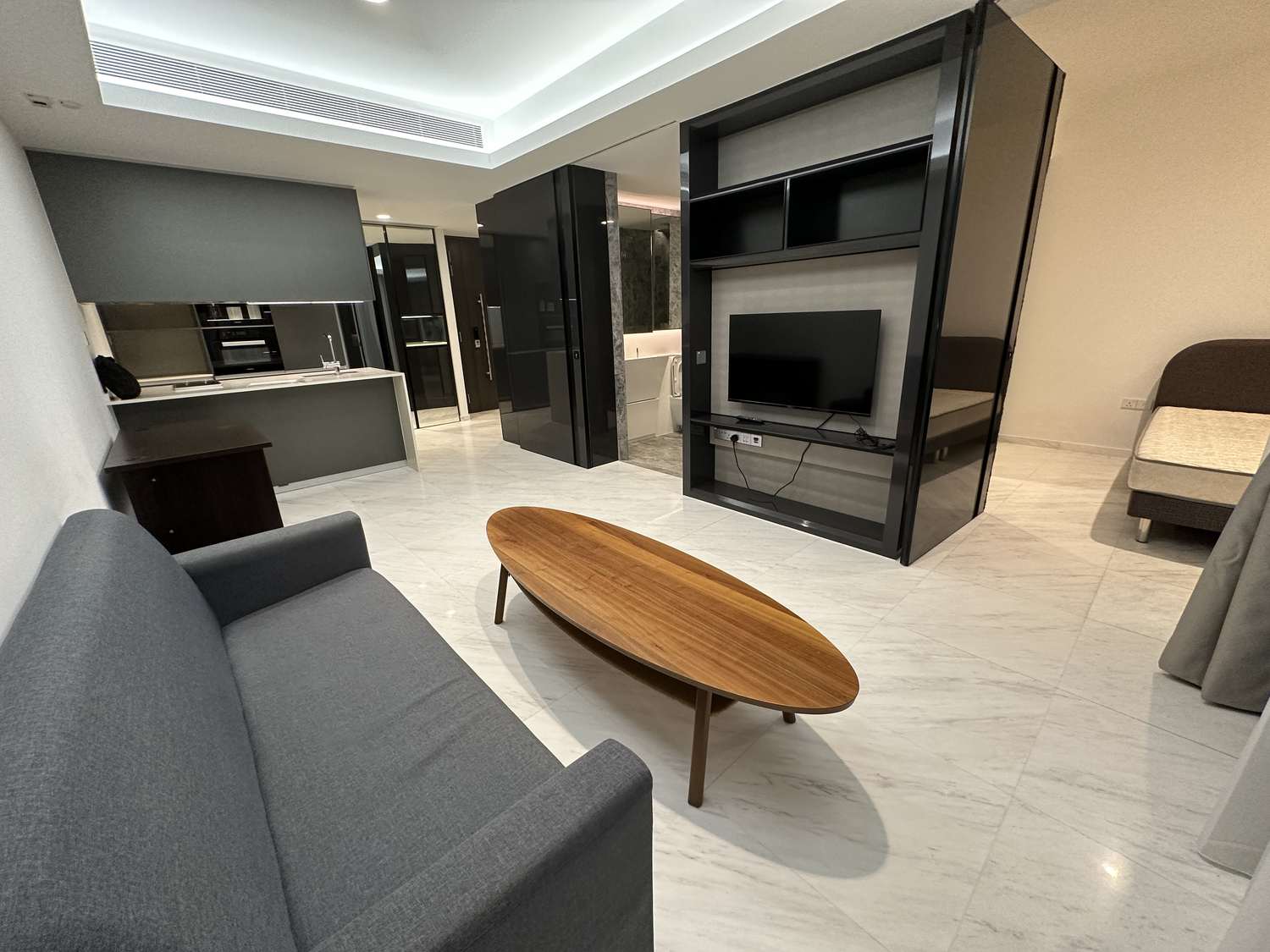 Cairnhill Nine living area with bedroom partition and TV feature