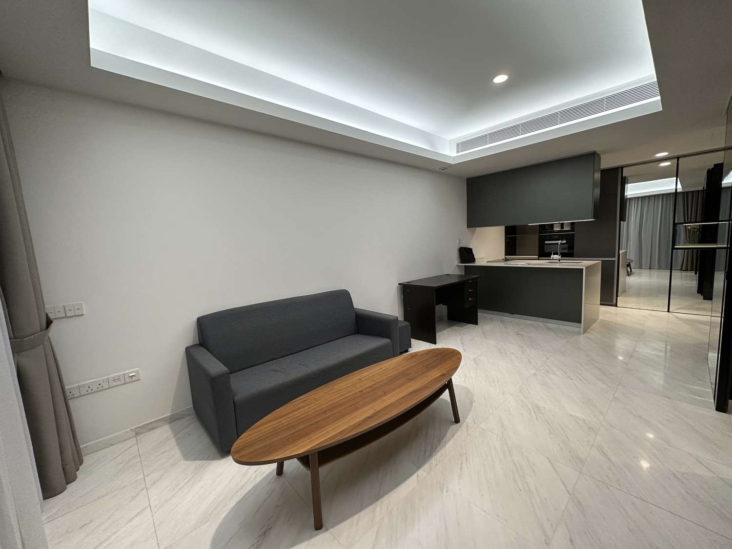 Cairnhill Nine living room and integrated kitchen