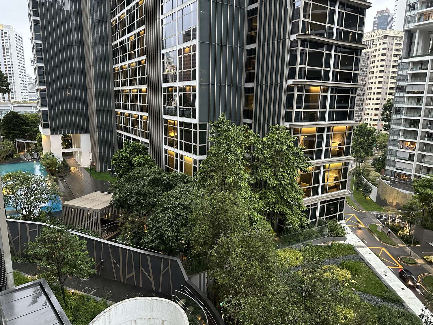 Cairnhill Nine balcony view towards facilities, greenery and nearby buildings