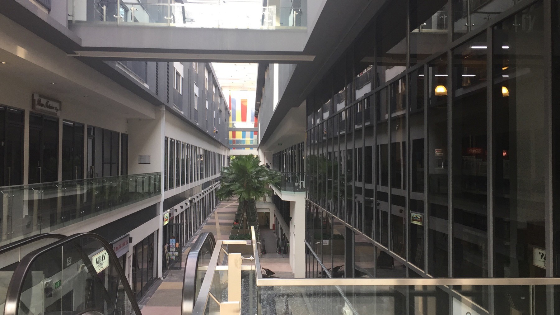 The Promenade @ Pelikat commercial atrium and shopfront corridor