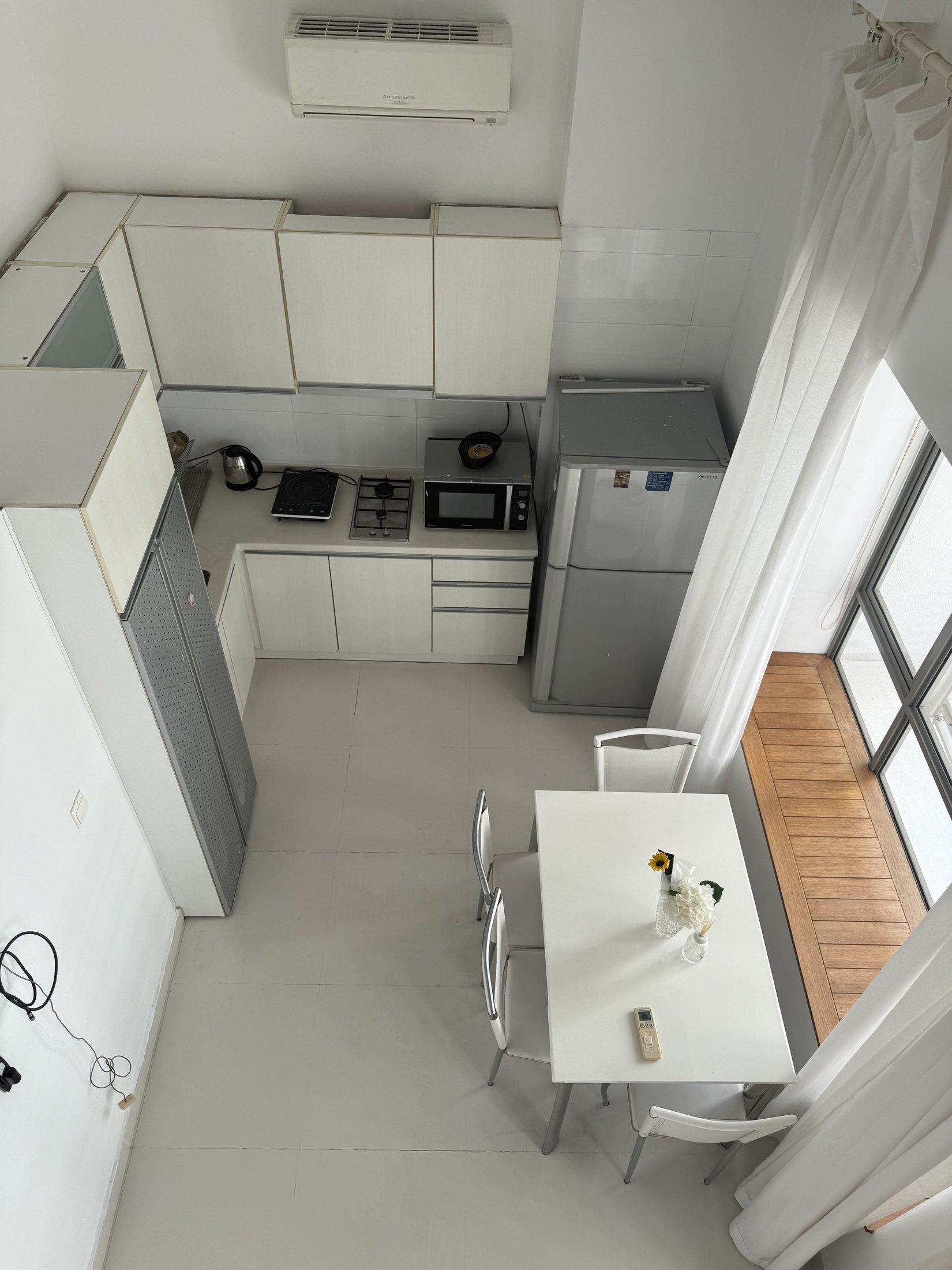 Robertson Edge penthouse kitchen and dining space with skylight