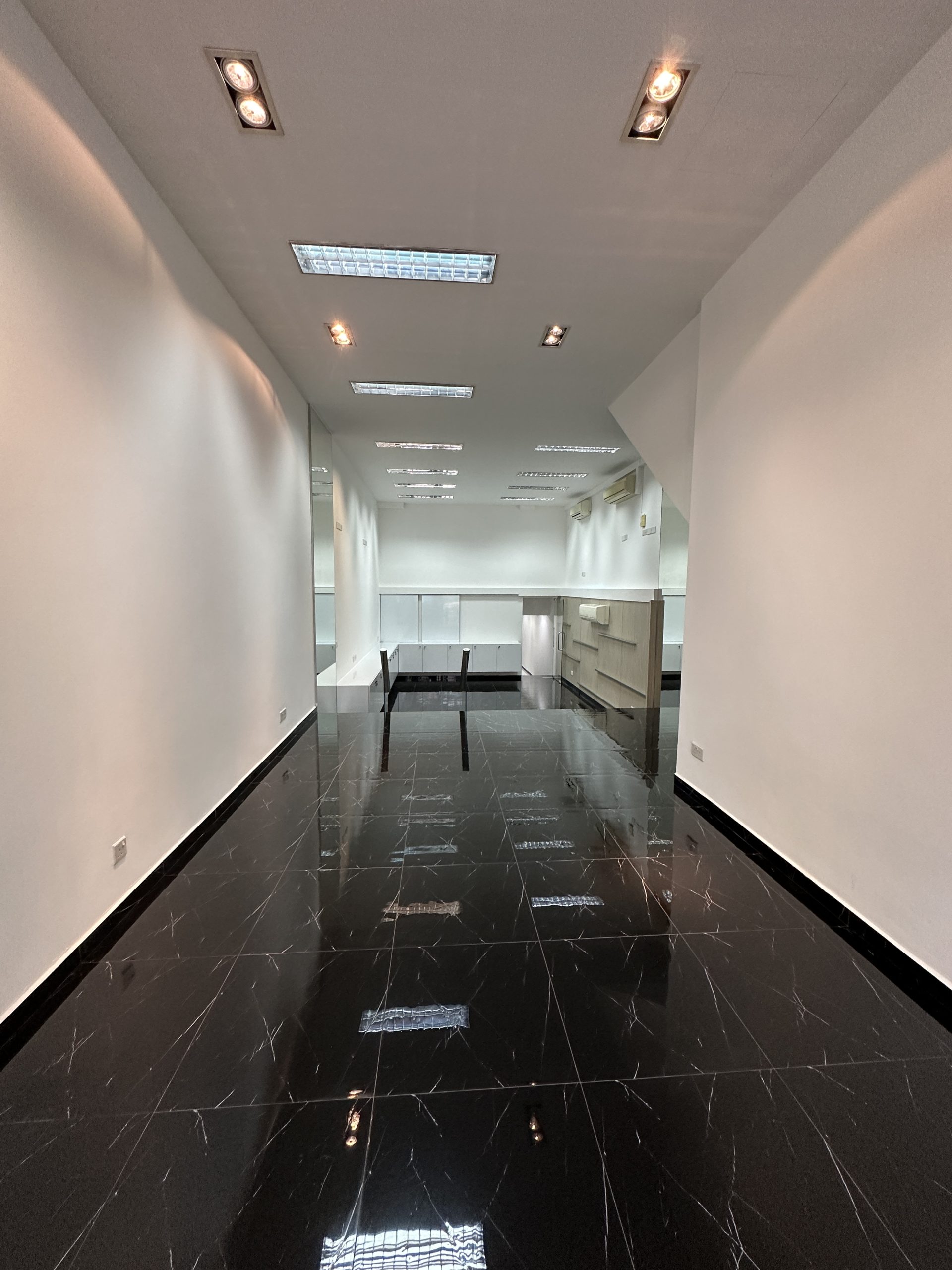 Long interior view of Cantonment Road shophouse