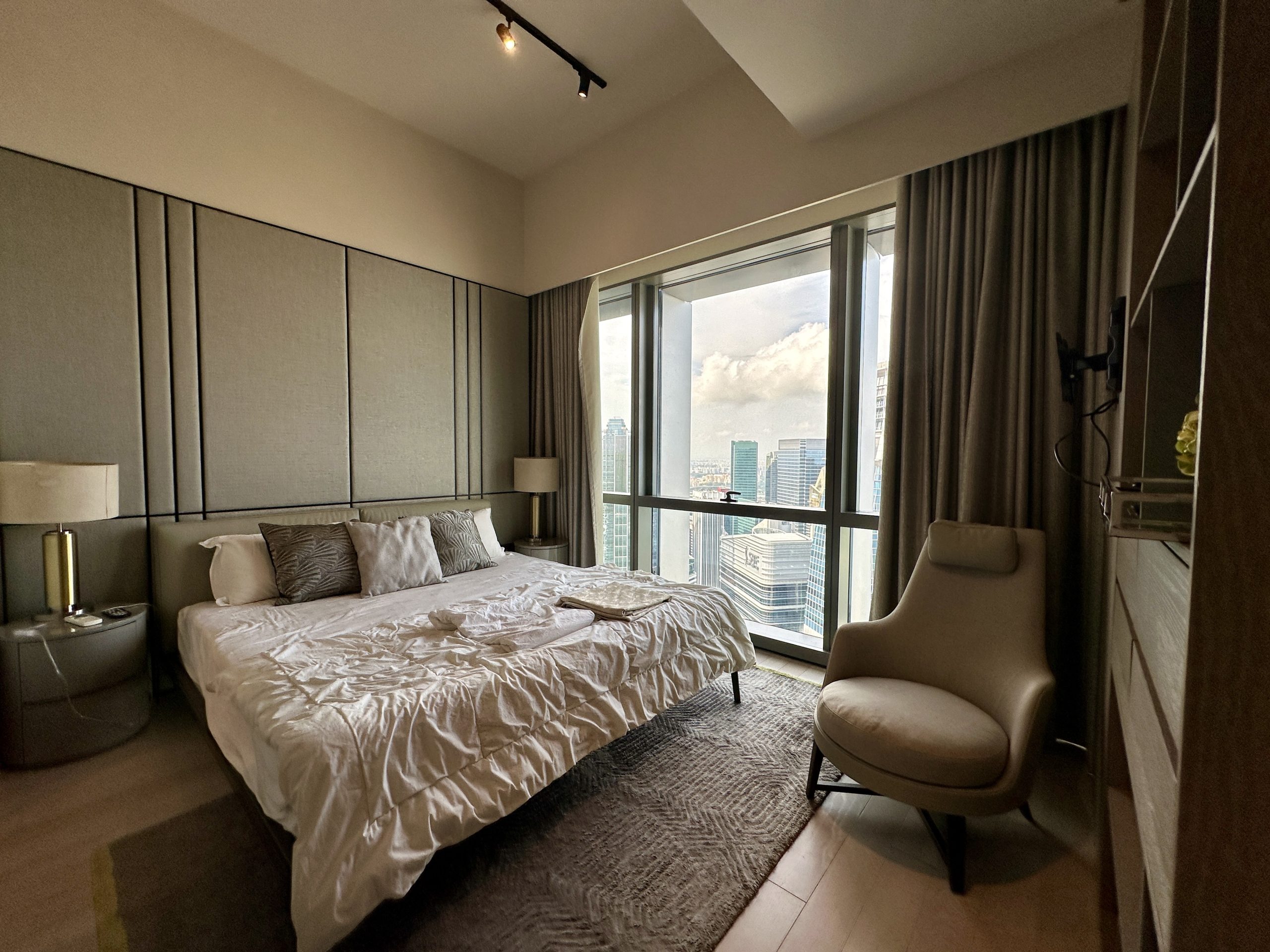 Wallich Residence bedroom with city view